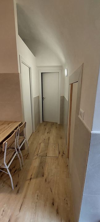 Disimpegno tra zona giorno, camera e bagno
